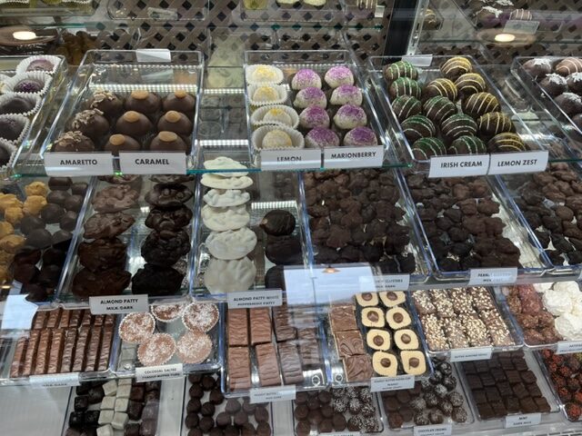 Yummy looking display case full of chocolates and truffles